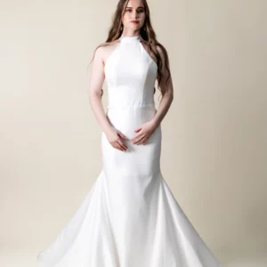 Seraphina satin wedding dress with halter neckline, pearl draped open back, and button train – front view