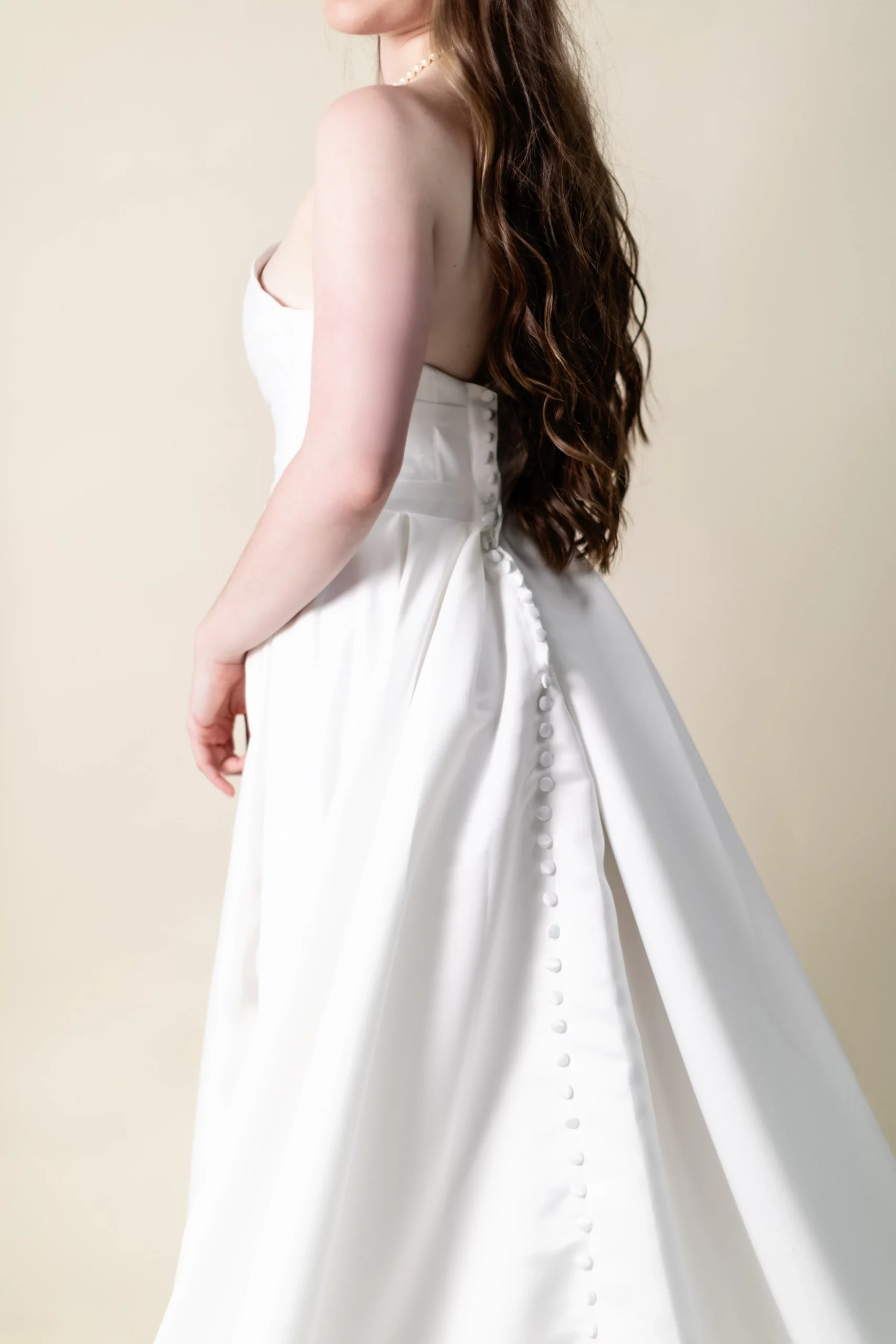 Vivien wedding dress back view with button detail and chapel train, laurel&lace bridals