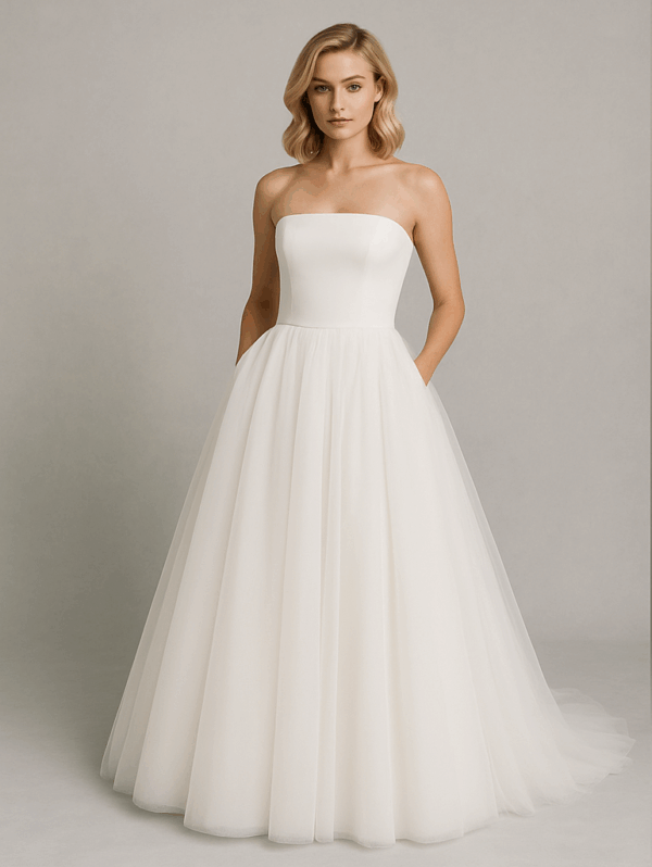 Bride wearing Grace strapless ball gown wedding dress with tulle skirt – front view