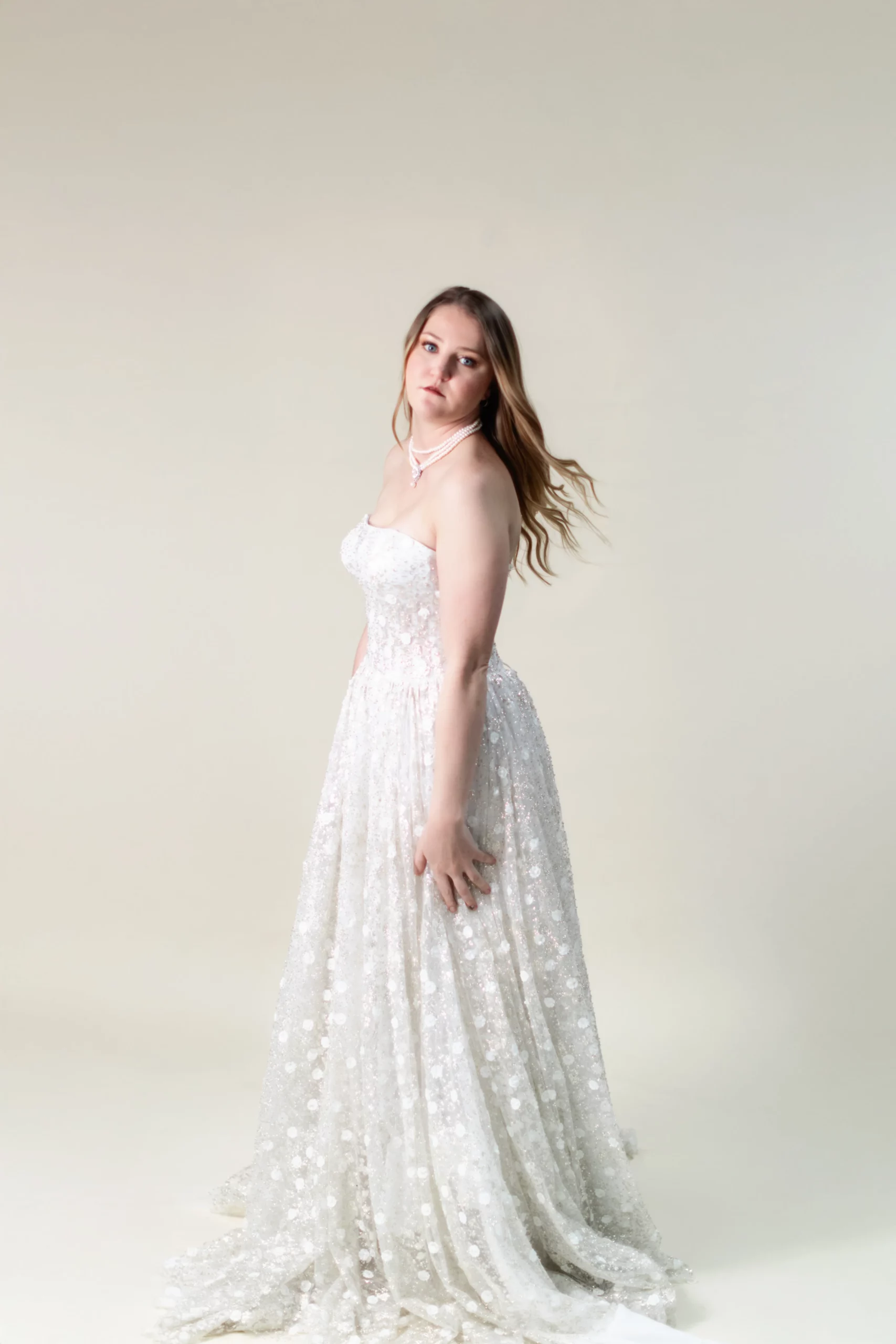 Marian strapless glitter tulle A-line wedding dress with floral appliqué – front view