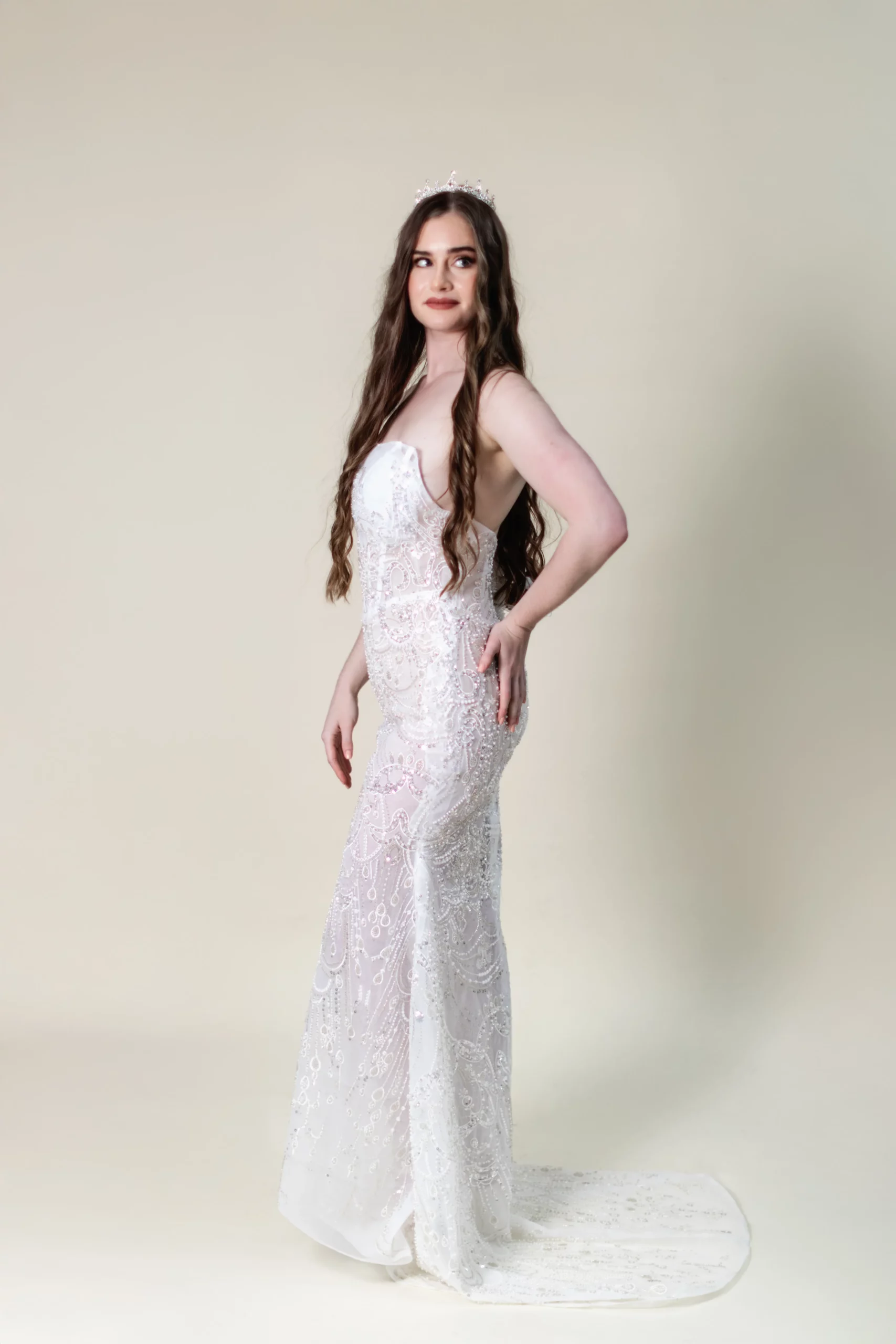Side profile of Celestia mermaid gown with sparkling contour details