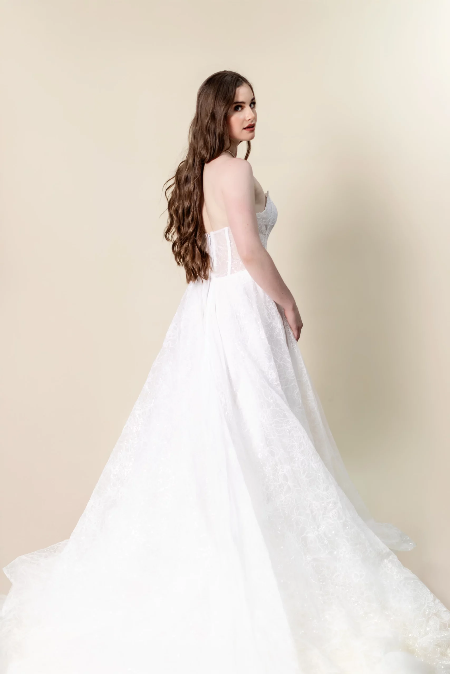 Side view showing ball gown skirt movement – Arabella dress
