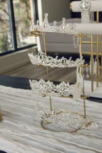 Luxury bridal boutique interior featuring 4 crowns and jewelry in the background at Laurel & Lace in Atlanta