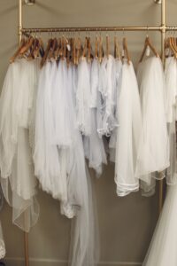 Luxury bridal boutique interior featuring elegant rack of veils at Laurel & Lace in Atlanta